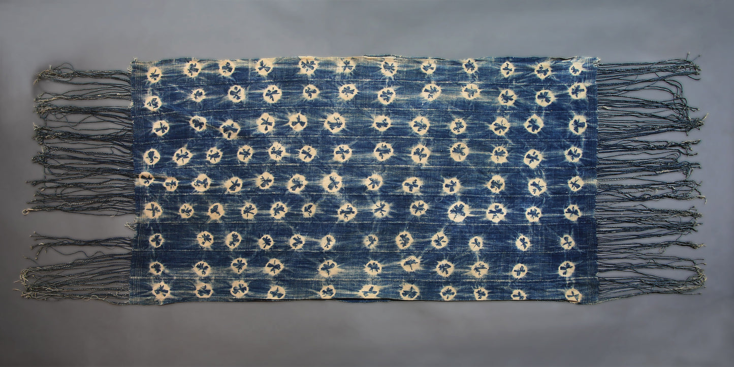 Handcrafted Textiles - Artisan Designed - Handcrafted African Art Textiles - Home Decor - Living Spaces - Mix Colors - Bold Patterns - Traditional Designs - African Culture - This Faded Indigo Scarf Tie Dye Fabric is a vintage African textile shawl that combines a signature faded blue hue with classic tie dye pattern. Crafted from high-quality fabric, this shawl is sure to bring a timeless style to your wardrobe. 60" X 32" Inventory # 10821