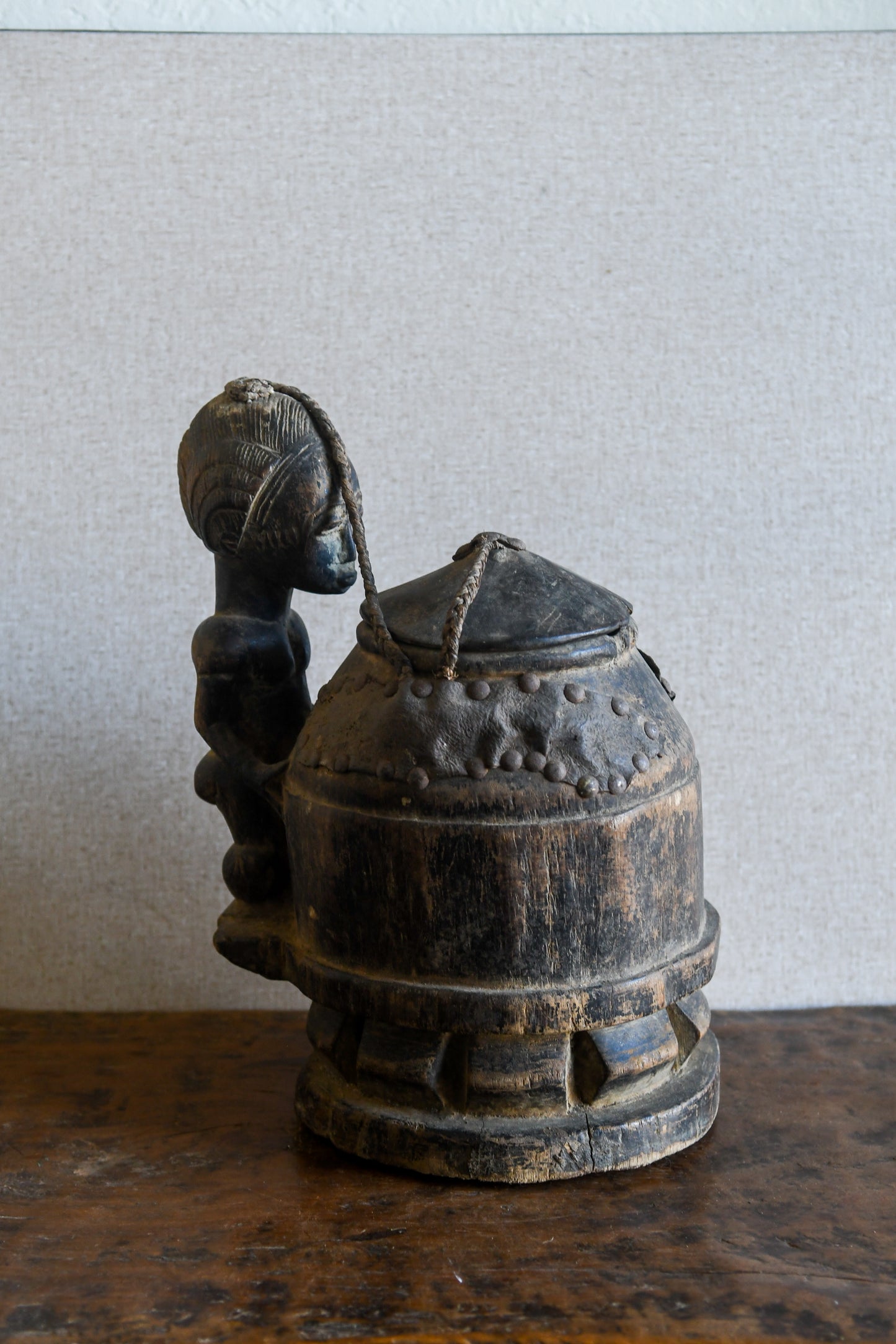 Tribal Objects - African Tribal Art - Ancient Ceremonial Art - Handcrafted Artifacts - Masks - Wood Sculptures - Iron Bronze Objects - Textiles - Art Pieces - African Folk Art - This unique Baule Divination Bowl Figure is an authentic piece of African art. It is an old carved wooden figure, crafted by highly skilled artisans, and is sure to make a statement in any space. The Divination Lidded Vessel Bowl is a perfect addition to any collection of sculptures and objects.Height : 15 inchesDepth: 4 inches