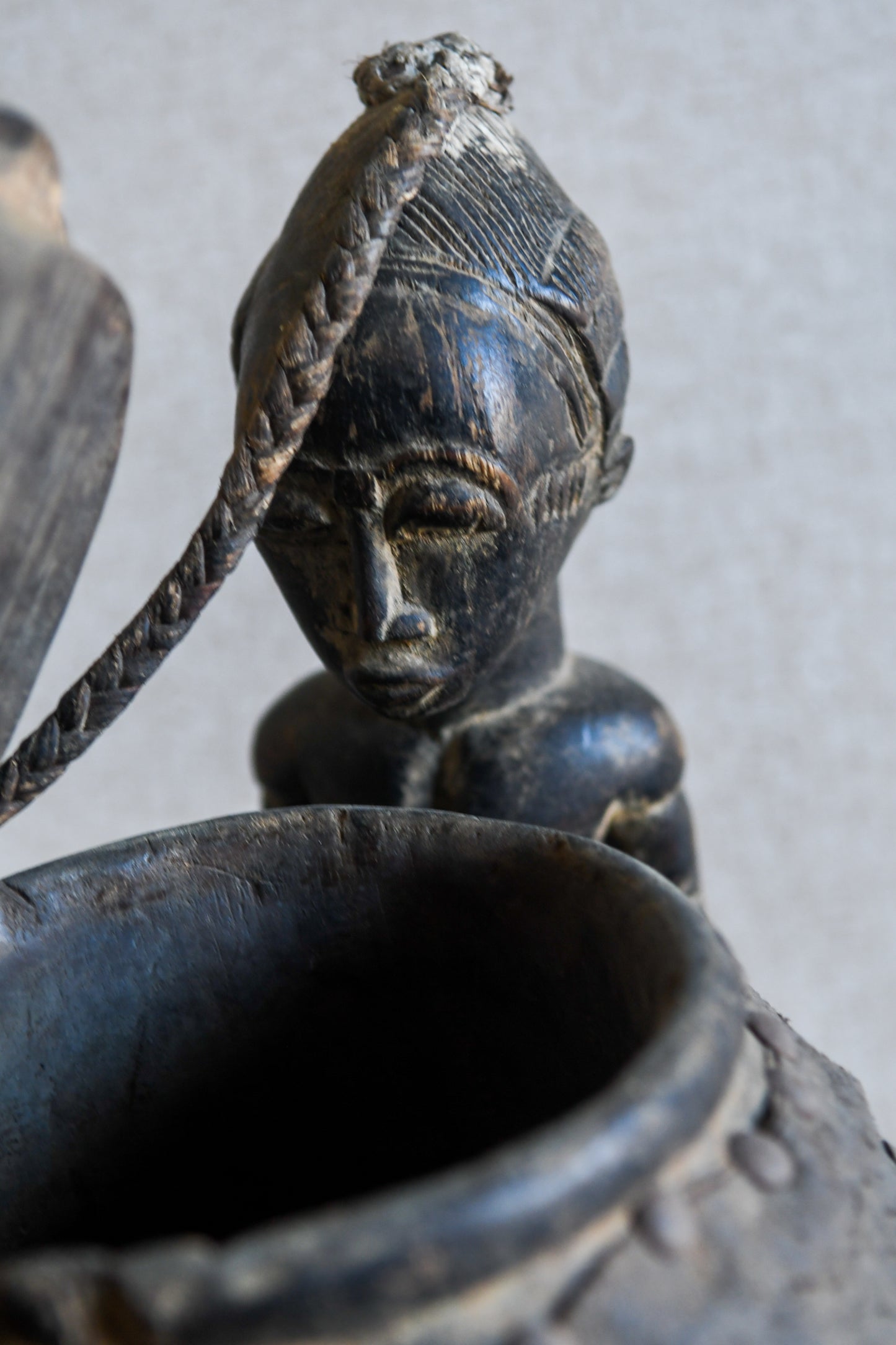 Tribal Objects - African Tribal Art - Ancient Ceremonial Art - Handcrafted Artifacts - Masks - Wood Sculptures - Iron Bronze Objects - Textiles - Art Pieces - African Folk Art - This unique Baule Divination Bowl Figure is an authentic piece of African art. It is an old carved wooden figure, crafted by highly skilled artisans, and is sure to make a statement in any space. The Divination Lidded Vessel Bowl is a perfect addition to any collection of sculptures and objects.Height : 15 inchesDepth: 4 inches