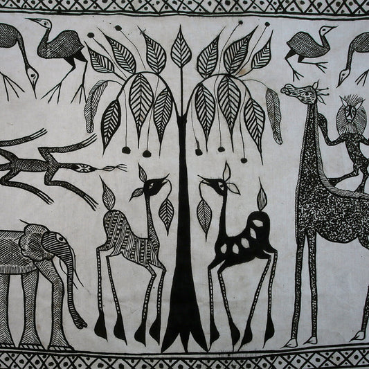 Handcrafted Textiles - African Art - Mudcloth Textiles - Traditional Designs - Home Decor - Living Spaces - 64" X 52 " Inventory # 10811 This Senufo cotton fabric is the perfect addition to any home or living space. It is hand painted, dyed black and white, and features beautiful mudcloth designs. The breathable cotton material makes it ideal for a variety of textile designs.