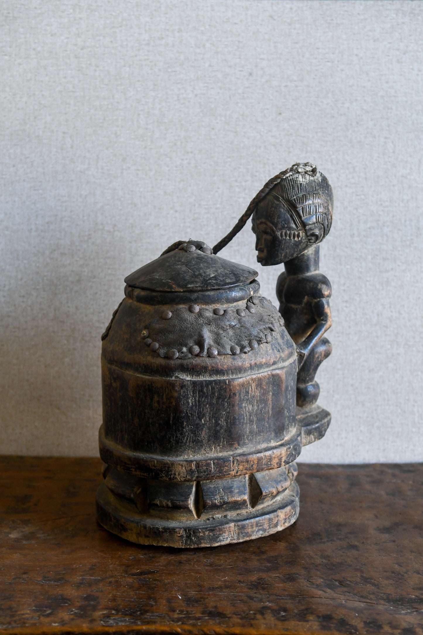Tribal Objects - African Tribal Art - Ancient Ceremonial Art - Handcrafted Artifacts - Masks - Wood Sculptures - Iron Bronze Objects - Textiles - Art Pieces - African Folk Art - This unique Baule Divination Bowl Figure is an authentic piece of African art. It is an old carved wooden figure, crafted by highly skilled artisans, and is sure to make a statement in any space. The Divination Lidded Vessel Bowl is a perfect addition to any collection of sculptures and objects.Height : 15 inchesDepth: 4 inches