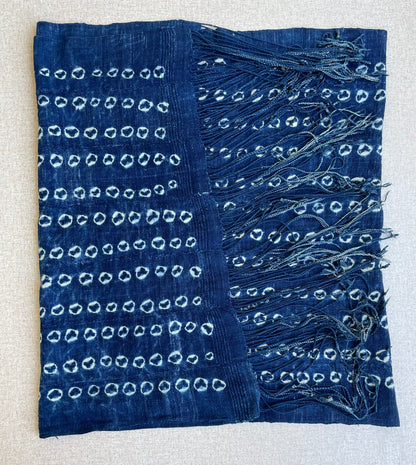 Handcrafted Textiles - Artisan Designed - Handcrafted African Art Textiles - Home Decor - Living Spaces - Mix Colors - Bold Patterns - Traditional Designs - African Culture - This Indigo Shibori Tie Dye Cotton Fabric is a stunning combination of African textile and hand-dyed color. Expertly crafted with attention to detail, this beautiful scarf provides long-lasting durability and a unique flair to any ensemble.  Length: 63 inches  Width: 24 inches