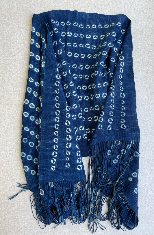 Handcrafted Textiles - Artisan Designed - Handcrafted African Art Textiles - Home Decor - Living Spaces - Mix Colors - Bold Patterns - Traditional Designs - African Culture - This Indigo Shibori Tie Dye Cotton Fabric is a stunning combination of African textile and hand-dyed color. Expertly crafted with attention to detail, this beautiful scarf provides long-lasting durability and a unique flair to any ensemble.  Length: 63 inches  Width: 24 inches