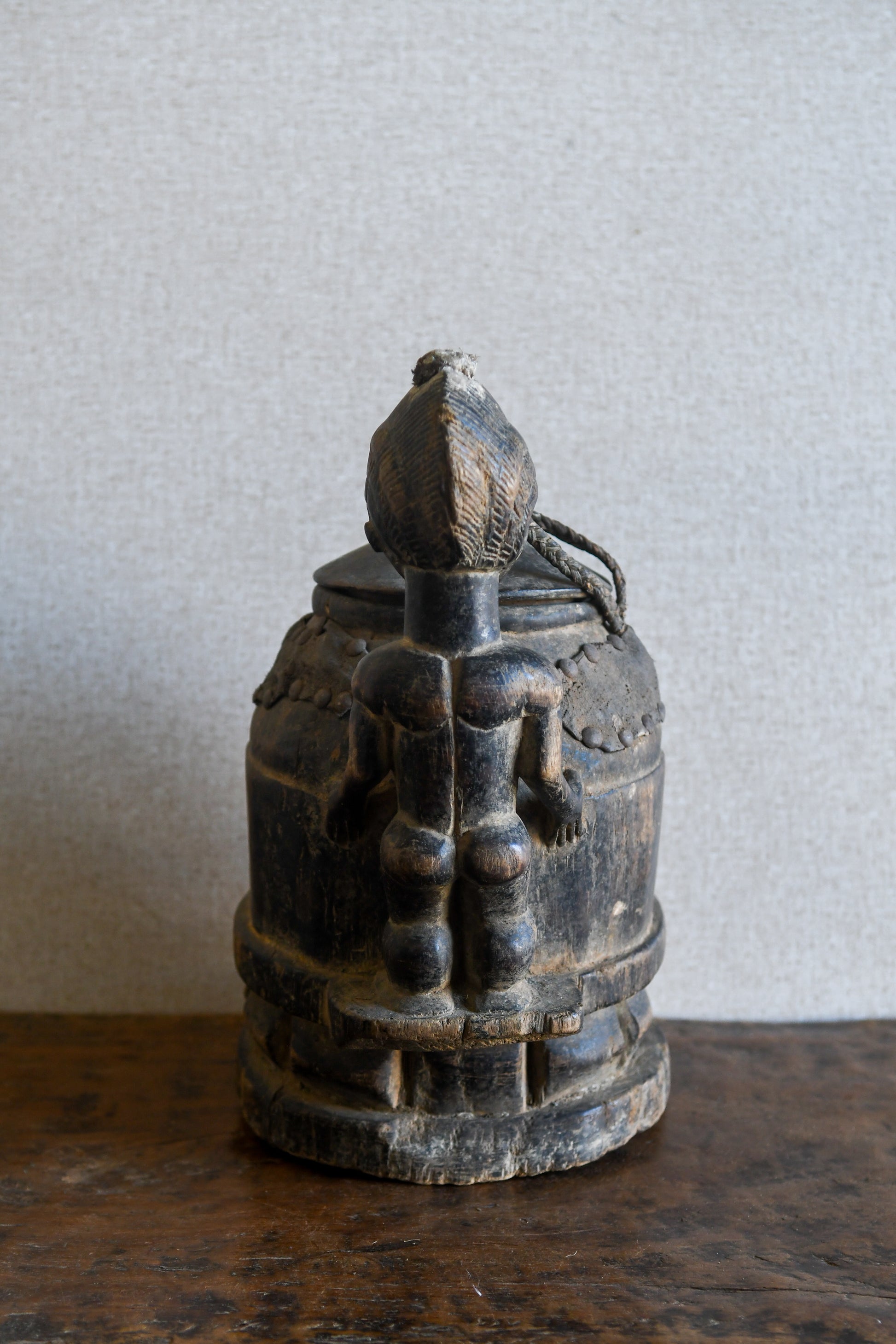 Tribal Objects - African Tribal Art - Ancient Ceremonial Art - Handcrafted Artifacts - Masks - Wood Sculptures - Iron Bronze Objects - Textiles - Art Pieces - African Folk Art - This unique Baule Divination Bowl Figure is an authentic piece of African art. It is an old carved wooden figure, crafted by highly skilled artisans, and is sure to make a statement in any space. The Divination Lidded Vessel Bowl is a perfect addition to any collection of sculptures and objects.Height : 15 inchesDepth: 4 inches