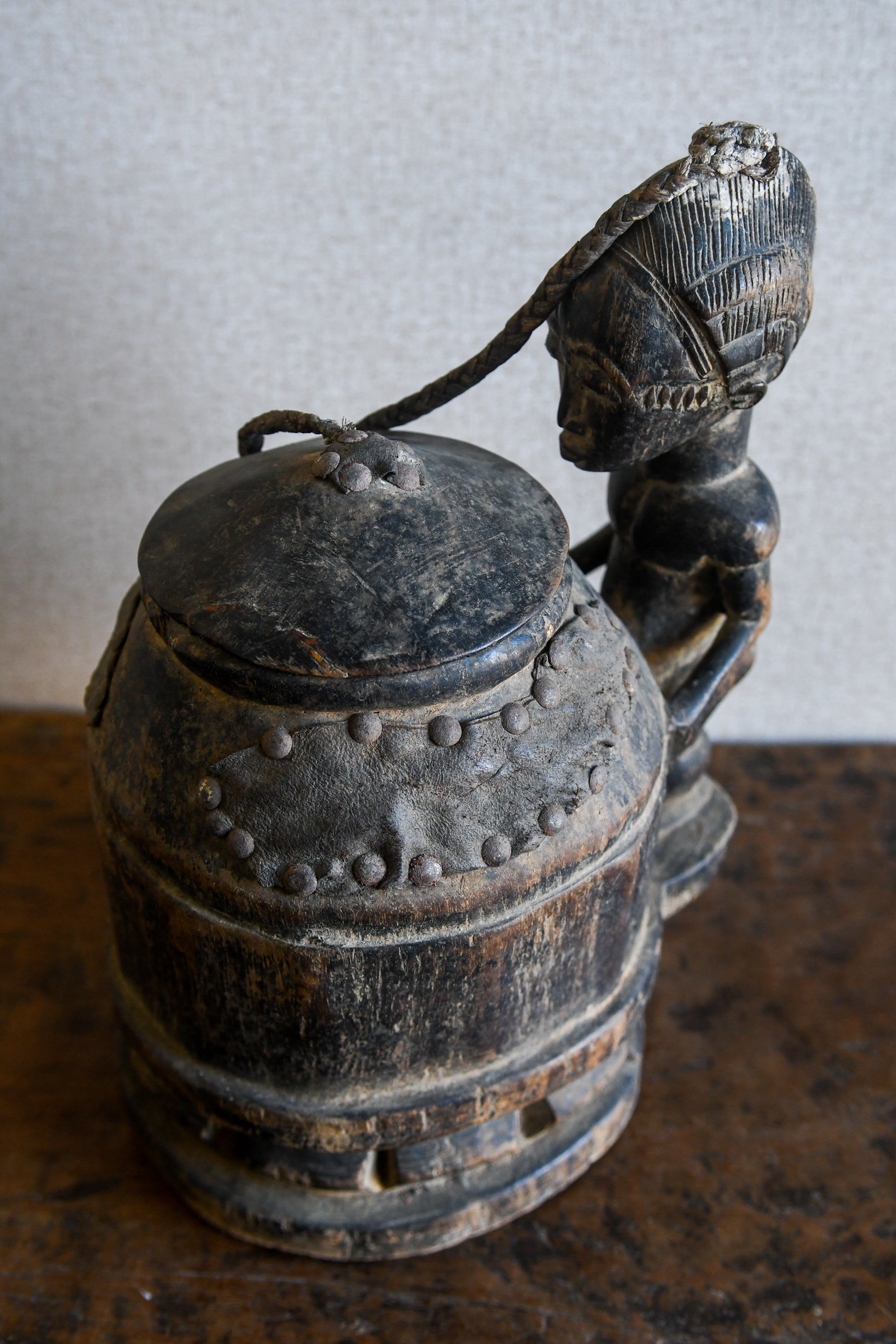 Tribal Objects - African Tribal Art - Ancient Ceremonial Art - Handcrafted Artifacts - Masks - Wood Sculptures - Iron Bronze Objects - Textiles - Art Pieces - African Folk Art - This unique Baule Divination Bowl Figure is an authentic piece of African art. It is an old carved wooden figure, crafted by highly skilled artisans, and is sure to make a statement in any space. The Divination Lidded Vessel Bowl is a perfect addition to any collection of sculptures and objects.Height : 15 inchesDepth: 4 inches