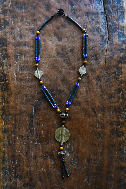 Tribal Necklaces - Handmade - African Art - Jewelry - Traditional - African Necklaces - Beaded - Collectible Necklaces - This Tribal Beads Bronze Pendant Necklace will add flair to any outfit. Crafted from bronze and featuring a unique African tribal design, it is sure to become a conversation starter. Enjoy this striking piece of jewelry and make a statement wherever you go. Length: 21 inches