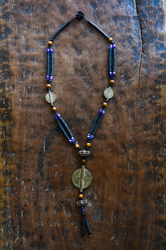 Tribal Necklaces - Handmade - African Art - Jewelry - Traditional - African Necklaces - Beaded - Collectible Necklaces - This Tribal Beads Bronze Pendant Necklace will add flair to any outfit. Crafted from bronze and featuring a unique African tribal design, it is sure to become a conversation starter. Enjoy this striking piece of jewelry and make a statement wherever you go. Length: 21 inches