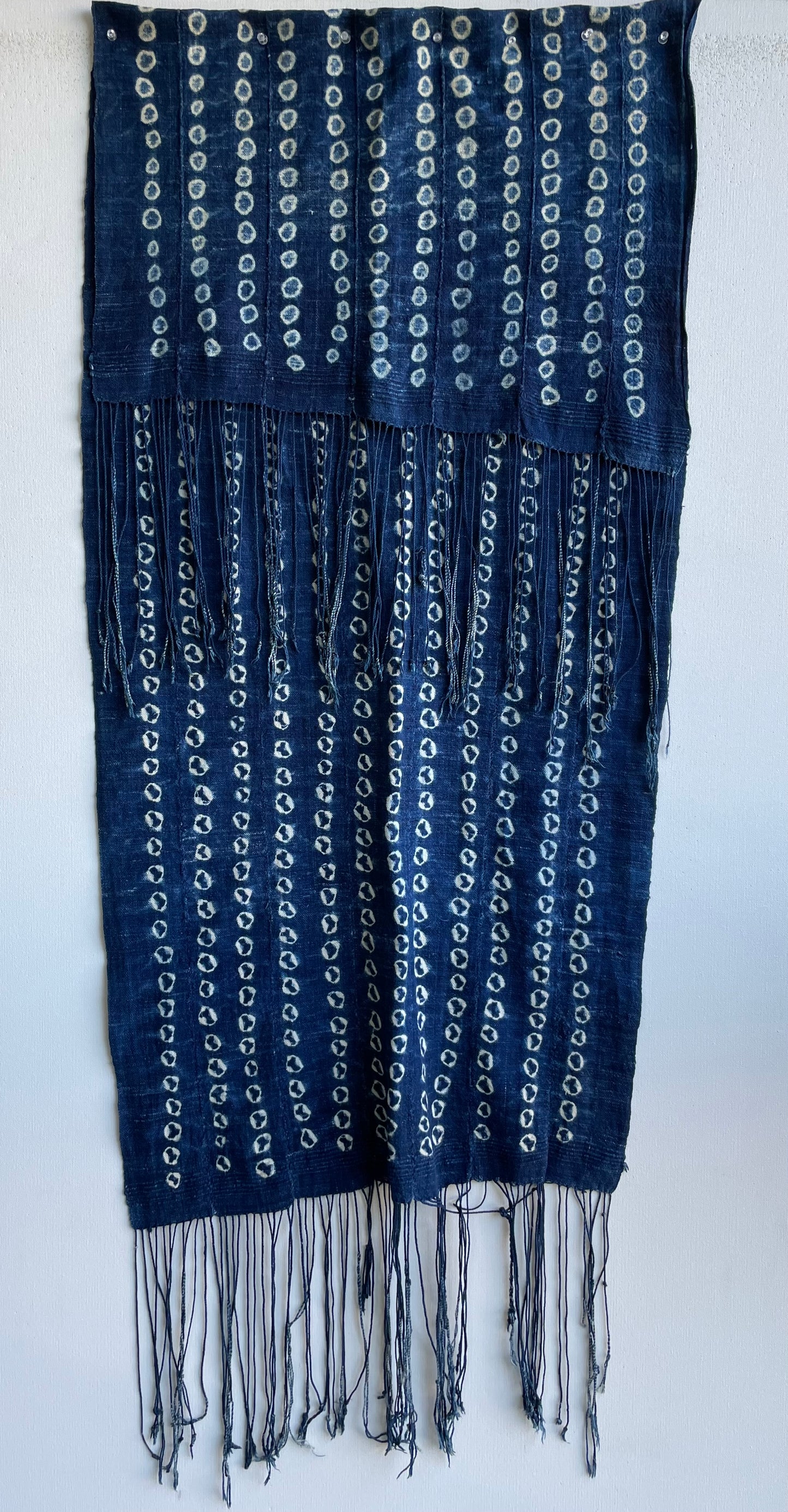 Handcrafted Textiles - Artisan Designed - Handcrafted African Art Textiles - Home Decor - Living Spaces - Mix Colors - Bold Patterns - Traditional Designs - African Culture - This Indigo Shibori Tie Dye Cotton Fabric is a stunning combination of African textile and hand-dyed color. Expertly crafted with attention to detail, this beautiful scarf provides long-lasting durability and a unique flair to any ensemble.  Length: 63 inches  Width: 24 inches