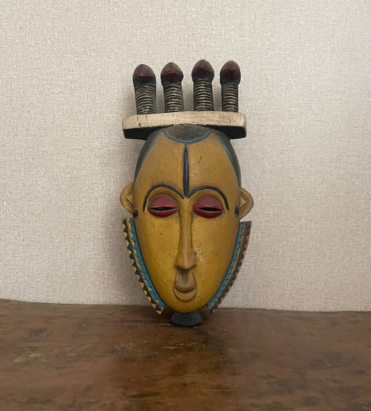 Handcrafted Masks - Artisan Designed - African Art Masks - Handcrafted Traditional - Home Decor - Business - Mask - Artwork - Any Space - African Art Mask - This hand-carved African Guro Mask brings an exotic, eye-catching beauty to any decor. Crafted of solid wood with a vintage design, it will bring a unique and timeless touch to any wall. Length: 13 Inches Width: 6 Inches