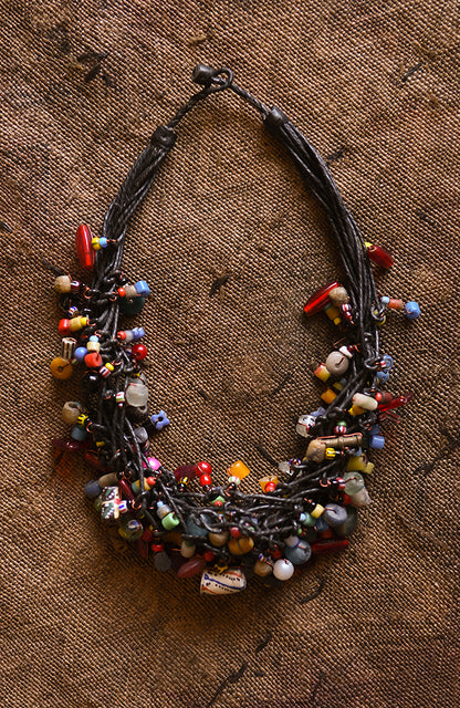 Handcrafted Necklaces - Handmade - African Art - Jewelry - Beaded Necklaces - This stylish necklace is handcrafted with gorgeous African trade beads, creating a bold statement piece that will upgrade any outfit. Perfect for adding a unique touch to your jewelry collection. Length: 10 inches Inventory # 10859