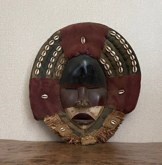 Handcrafted Masks - Artisan Designed - African Art Masks - Handcrafted Traditional - Home Decor - Business - Mask - Artwork - Any Space - African Art Mask - This unique Hand Carved Wooden Dan Mask offers a timeless piece of art for your home decor. Crafted with precise traditional methods, it is a perfect way to add character and warmth to any space. Enjoy the intricate details of this vintage African art, a one-of-a-kind item that is sure to make a bold statement in any room.